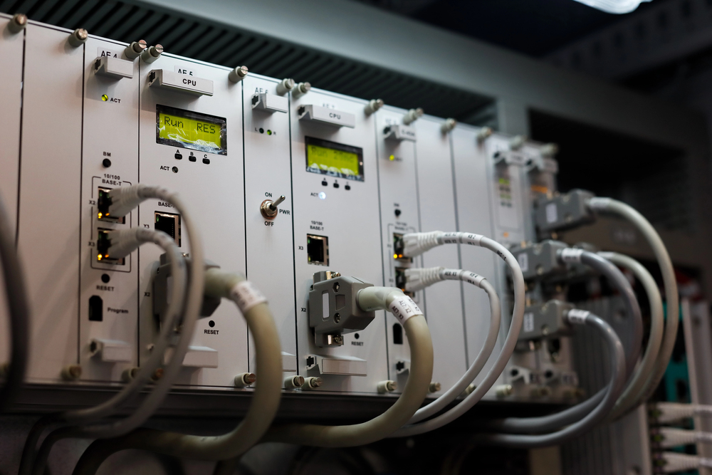 PLC control panel with programming laptop